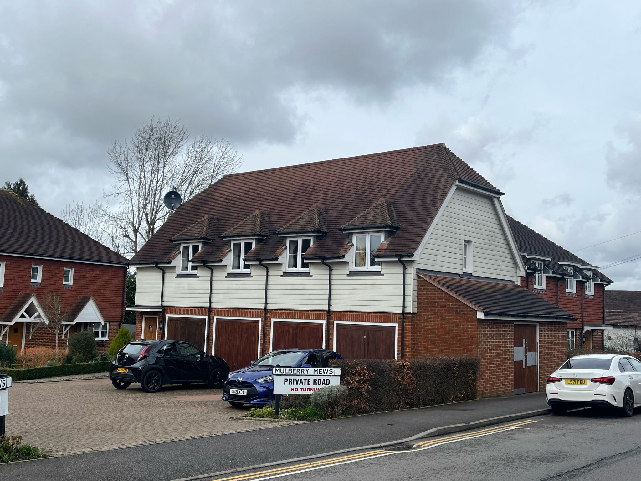 Buildings with a parking forecourt.
